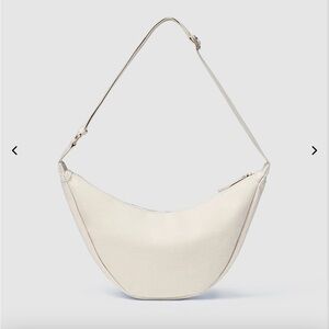 JULY everyday crescent bag in natural color new without tags